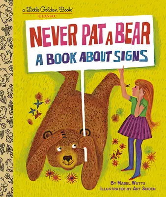 Niciodată să nu pălmuiești un urs: O carte despre semne - Never Pat a Bear: A Book about Signs